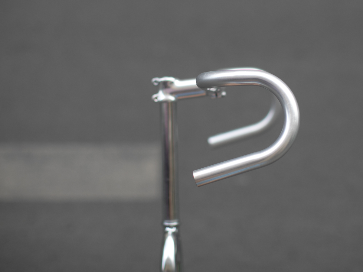 CRUMB x NITTO Futen Drop handlebar side profile showing the deep drop curve and open end, polished aluminium finish