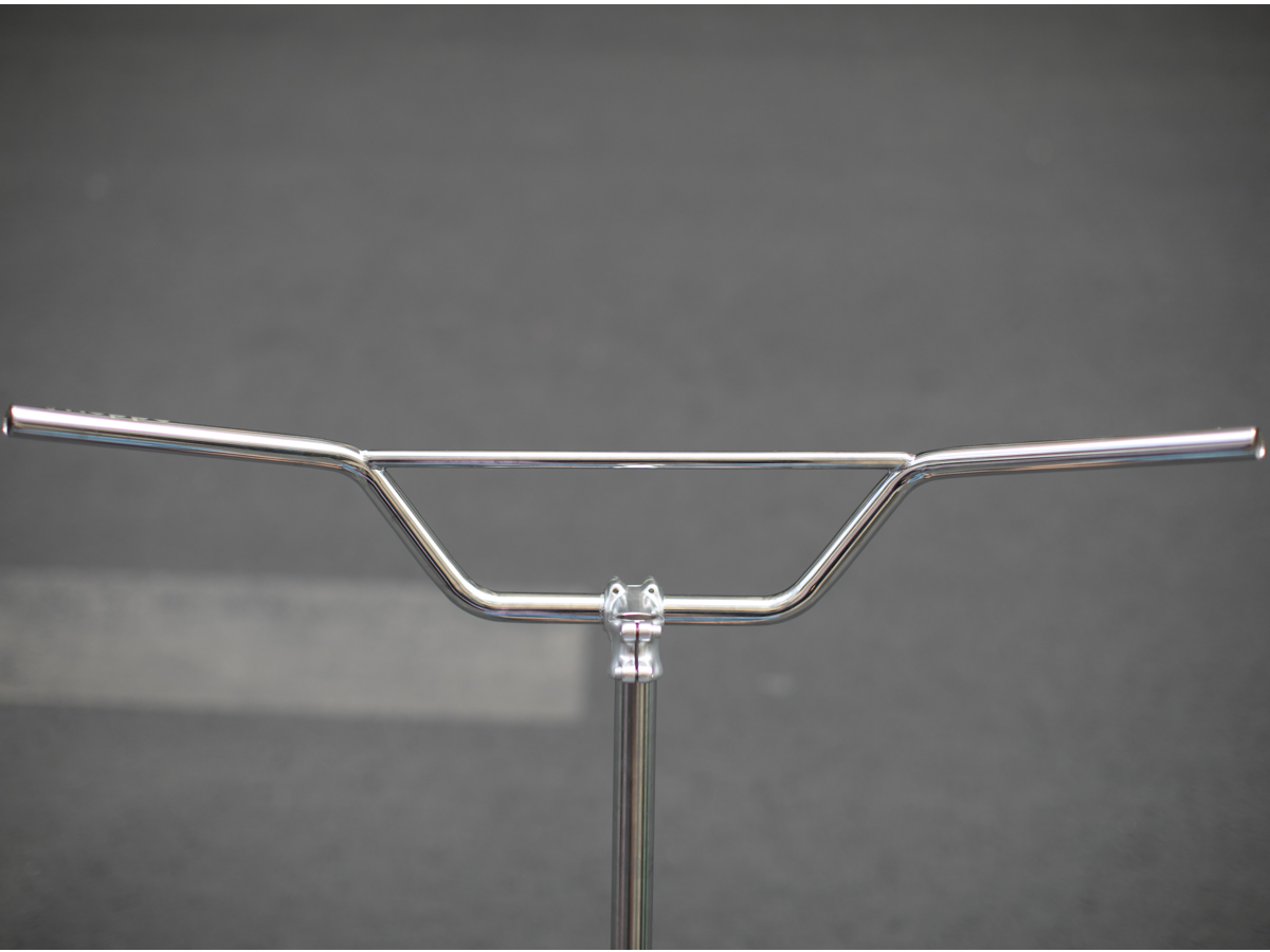 Magic Components Noppo Bar, front view showing the full 800mm width. The wide, shallow sweep of the bar and the central crossbar brace are clearly visible.